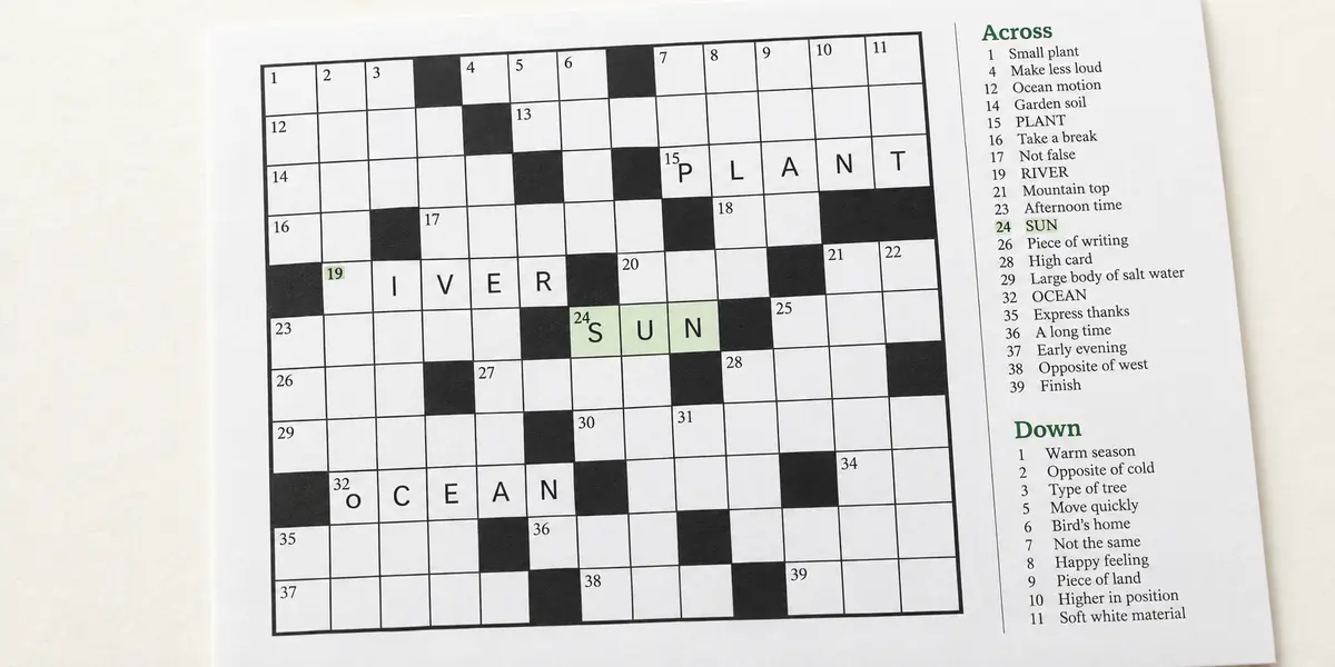 A printed crossword puzzle with numbered squares, clue lists, and a few filled answers.